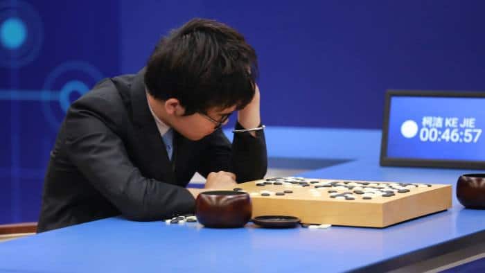 Photo of Ke Jie playing AlphaGo