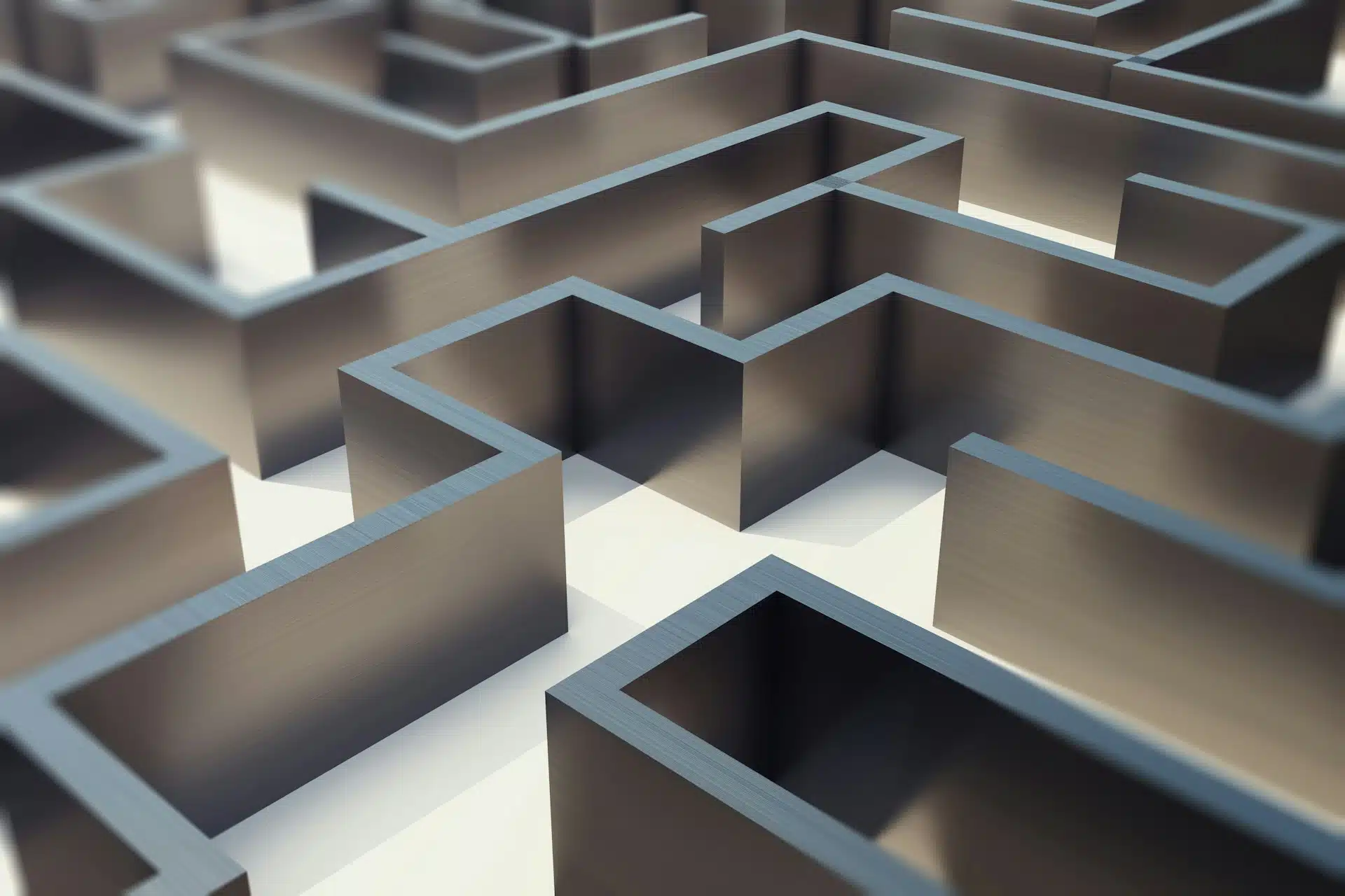 A metallic 3D maze with sharp edges and interconnected paths, resembling an abstract problem-solving scenario.